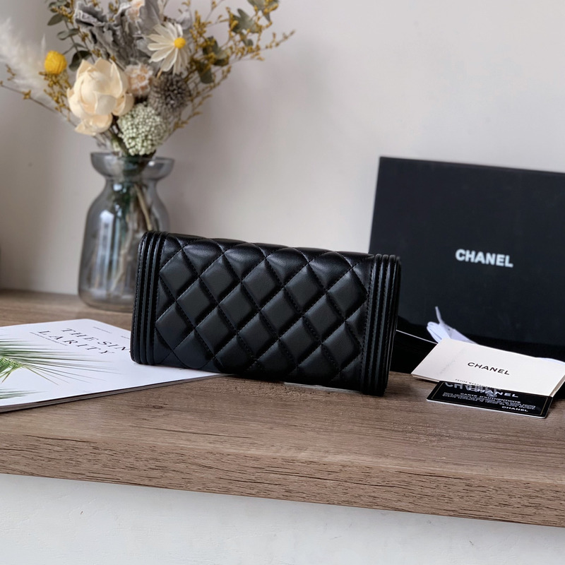 Ch*el boy Ch*el long flap wallet gold tone metal black