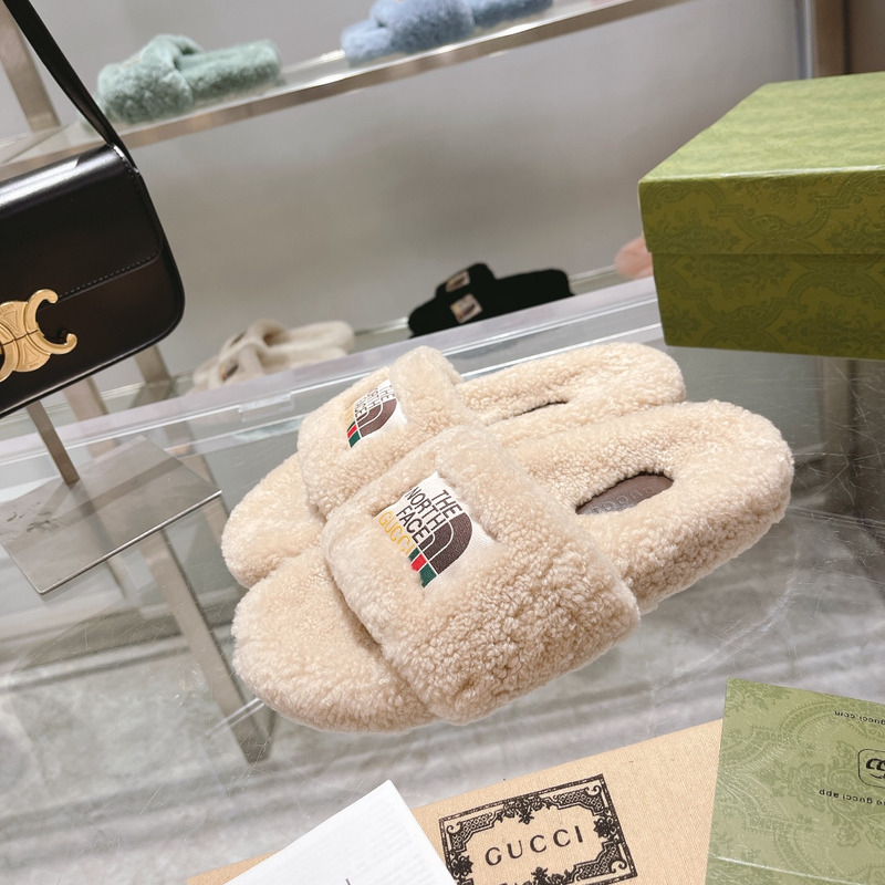 g*u*i x the n0*h F**e shearling slides beige